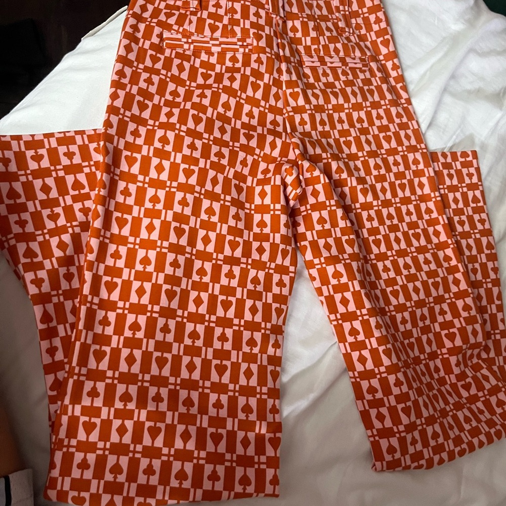 Anthropologie Orange and White Patterned Flare Pants